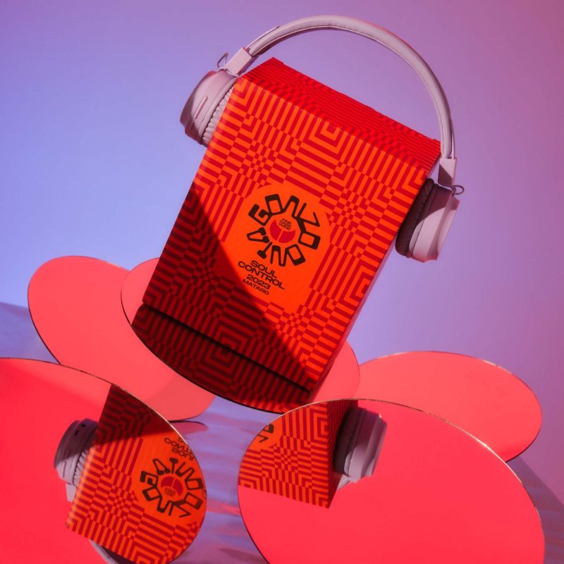 a cask of gonzo vino mataro wearing a pair of headphones